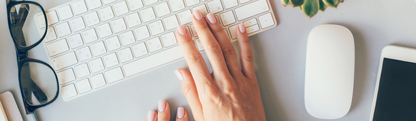 a hand on a keyboard