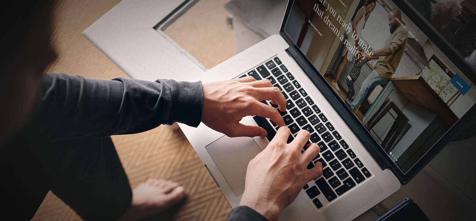 a person working on their laptop computer