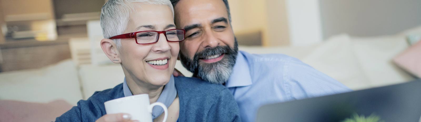 a mature couple having coffee